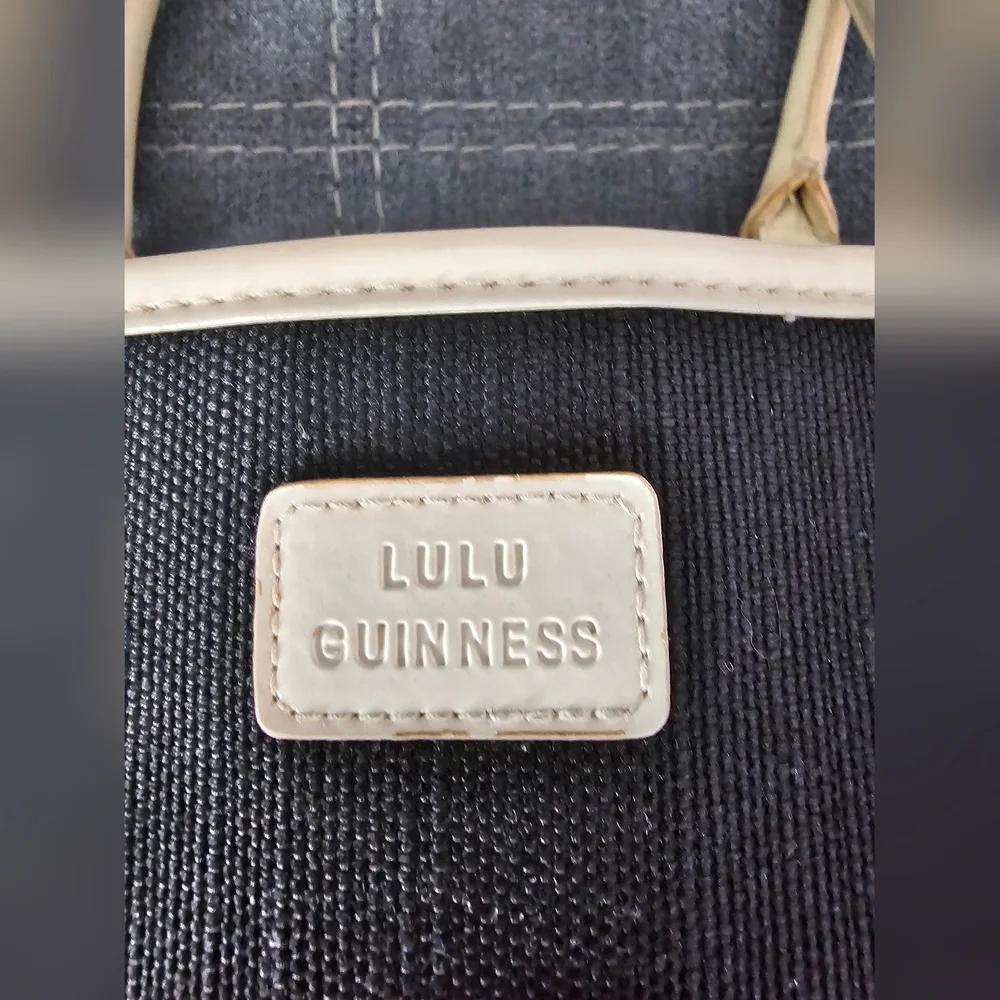 Elegant Lulu Guinness black canvas and beige leather trim shoulder bag